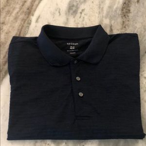 A dark blue men’s dress shirt